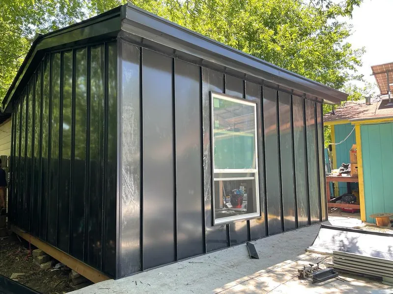 Black standing seam metal wall panels for Metal Roof Installation in Quantico Base