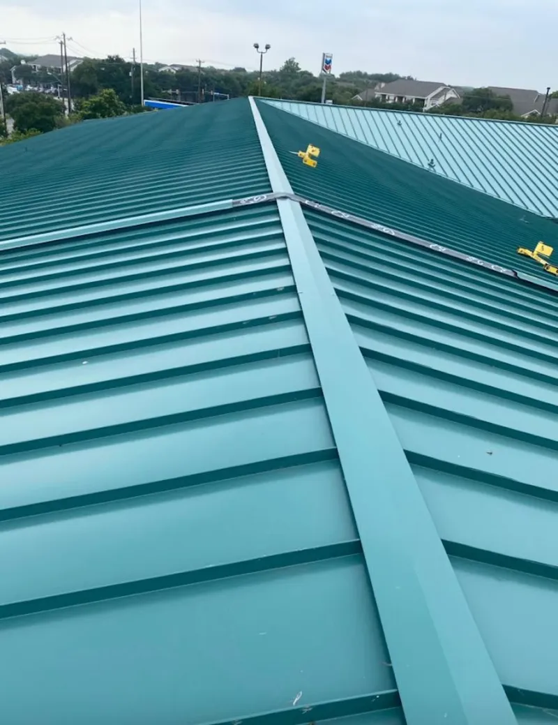 Green commercial metal roof ridge and valley for Metal Roof Repair in Quantico Base